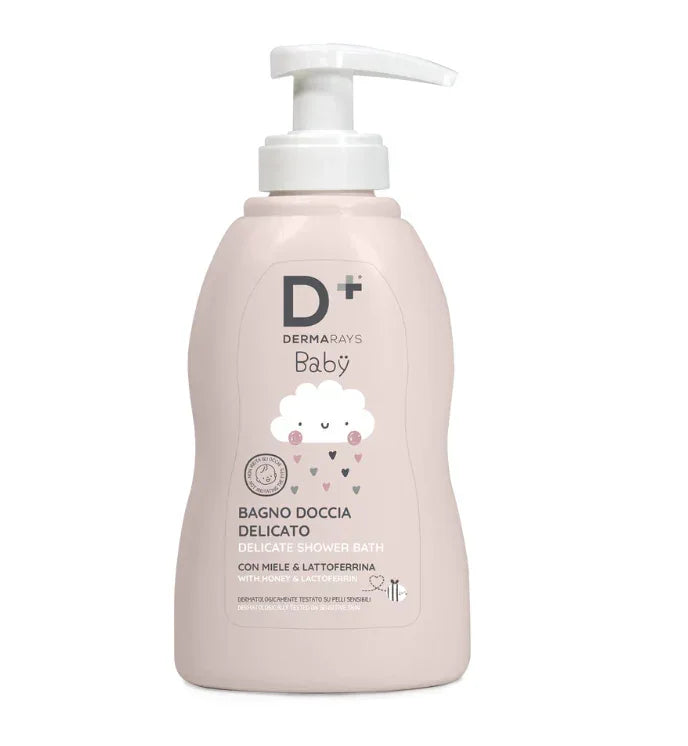 Gel de duș Baby DERMARAYS 200ml, sticlă roz pal cu pompă albă, etichetă cu desene norișor și inimioare.